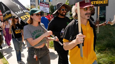 Comedians energize the picket lines as Hollywood actors and writers strikes enter second week